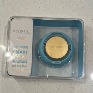 FOREO Gold and Blue Makeup Device